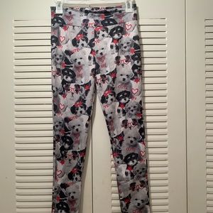 Black, pink, grey and white leggings.